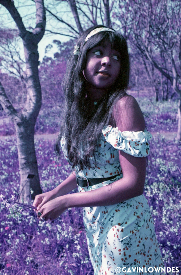 Woman shot in a purple forest with lomography purple film