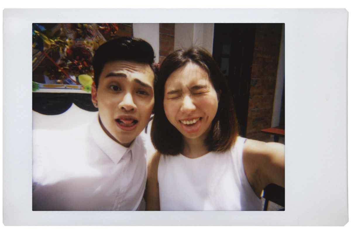 lomo instant mini film picture of a happy couple posing