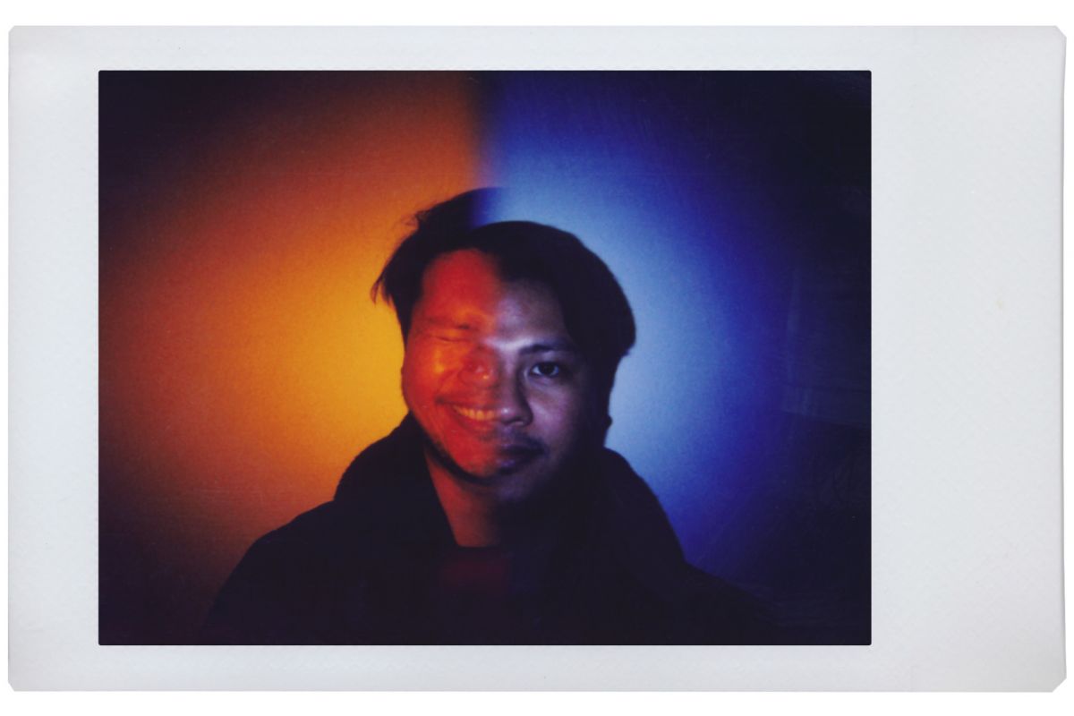 lomo instant mini picture of a man smiling