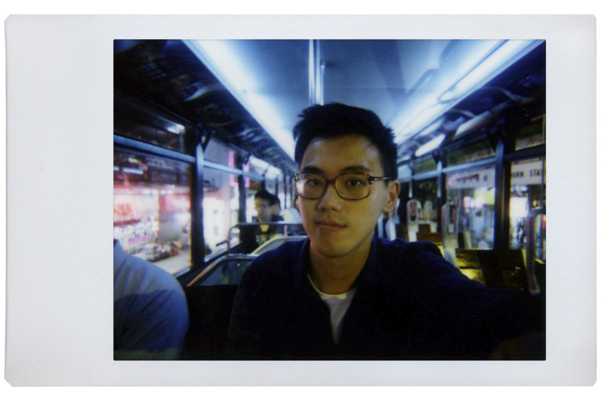 lomo instant mini film picture of a young man with glasses