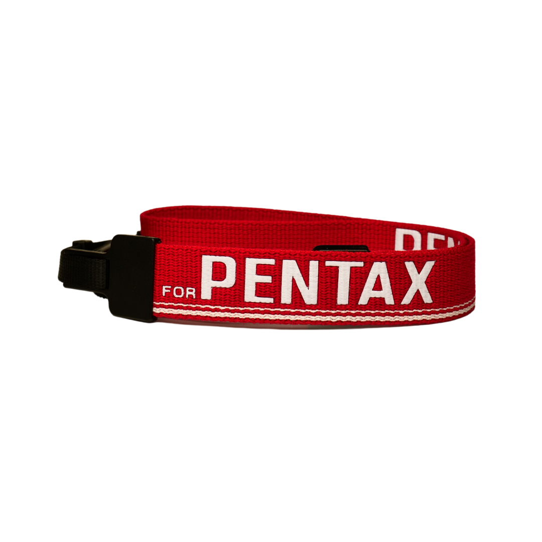 Red and White Pentax Strap showing pentax text 'for pentax'